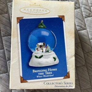 Hallmark Keepsake Ornament. Bringing Home the Tree. 2002
